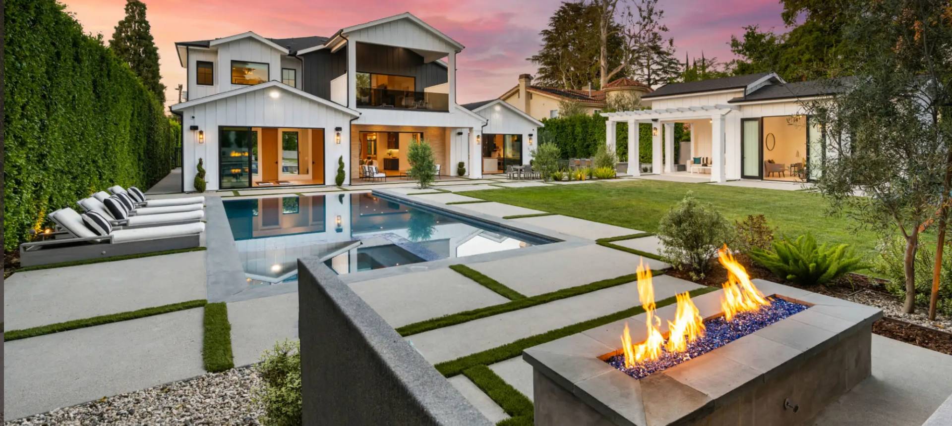 Modern house with a pool and firepit